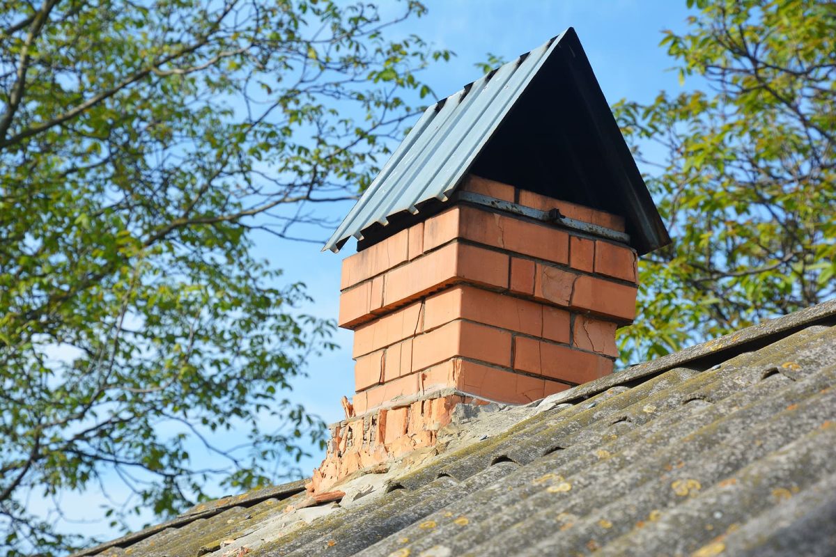 chimney repairs bath - damaged brick chimney with metal sheets